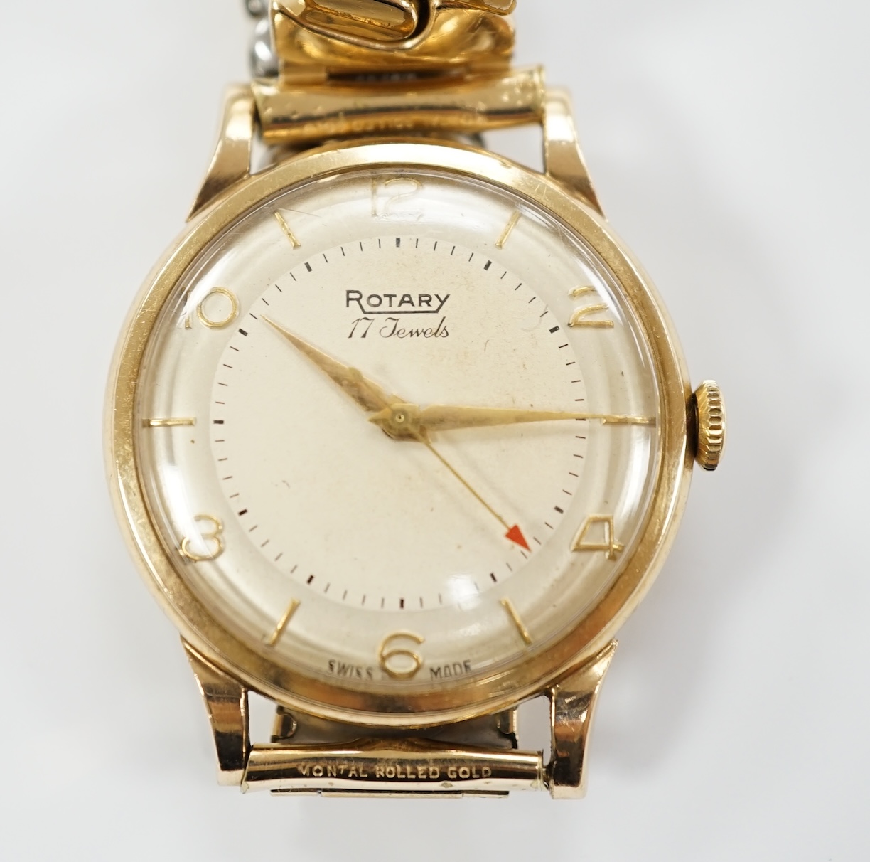 A gentleman's 1950's 9ct gold Rotary manual wind wrist watch, with associated steel and gold plated flexible bracelet.